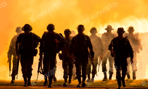 Preview: Silhouette of soldiers walking against smoke and sunset background.