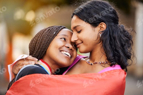 Preview: Love, hug and happy lesbian couple at a freedom, equality or LGBTQ festival, event or parade. Happi
