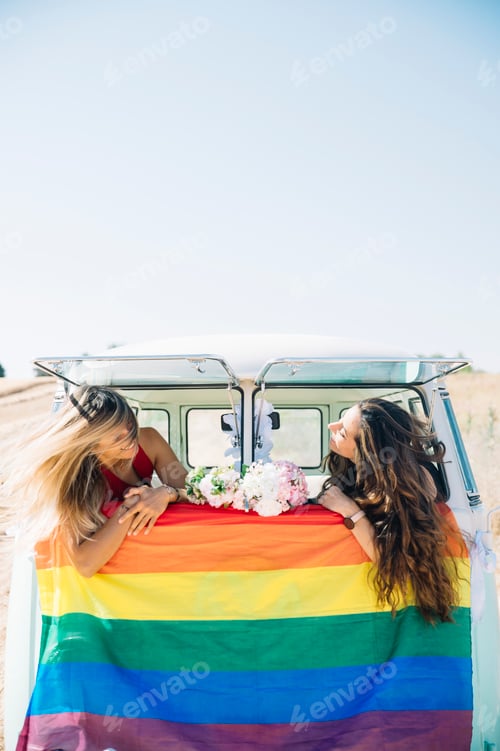 Preview: Two happy lesbian women in the old van