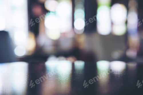 Preview: Wooden table in cafe with blur bokeh abstract vintage background