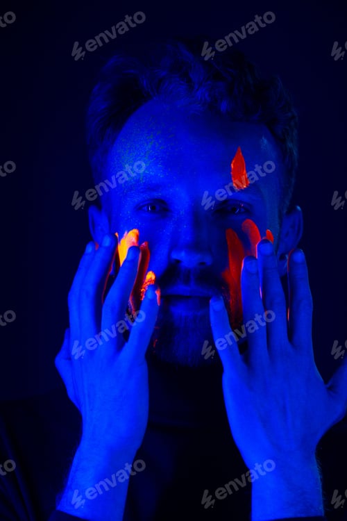 Preview: Caucasian male model with blacklight paint.
