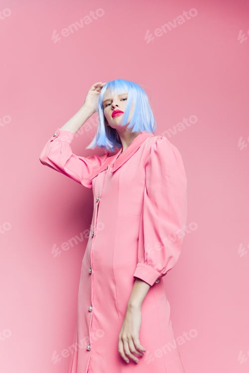 Preview: female in blue wig pink dress red lips isolated background