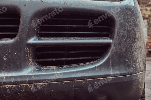 Preview: Close-up image of a dirty car after a trip around the countryside