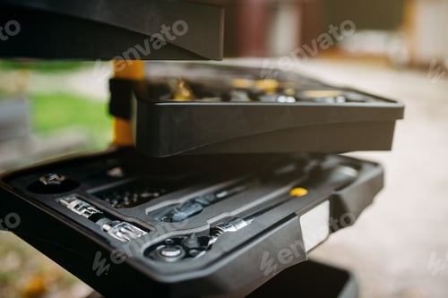 Preview: Bicycle tools in box closeup, blur background