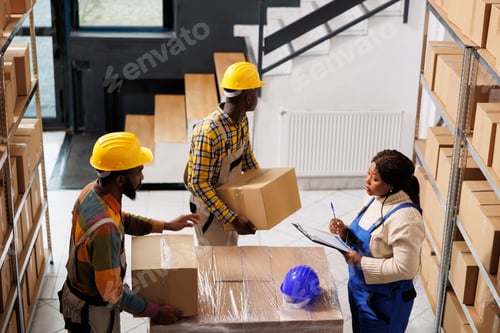 Preview: Warehouse loaders lifting parcels ready for shipment