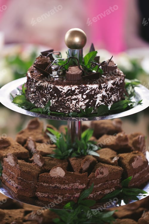 Preview: Beautiful wedding cake for the newlyweds at the wedding. A birthday cake at a banquet.