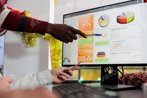 Preview: Employee showing data on computer screen