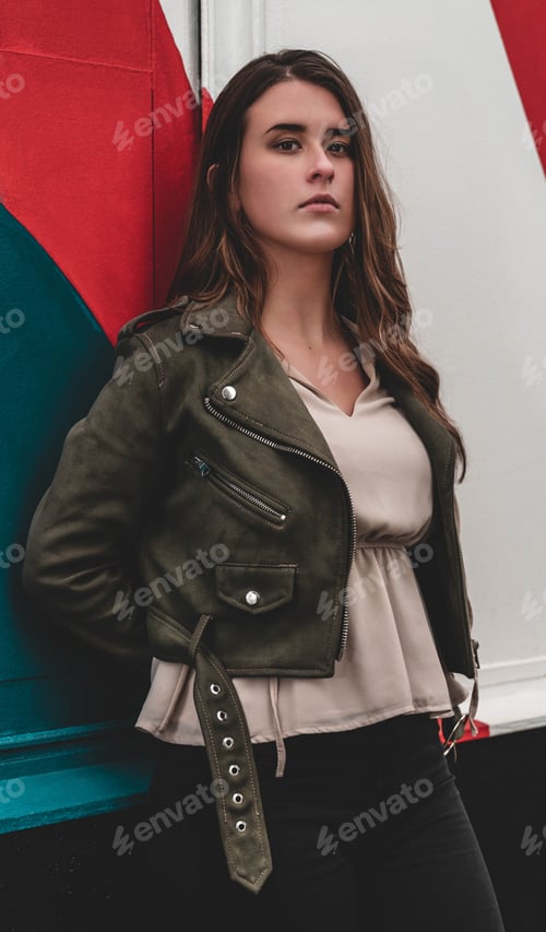 Preview: Portrait of a Caucasian female leaning on the wall