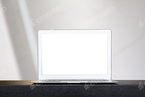 Preview: Laptop Computer with White Screen on Table
