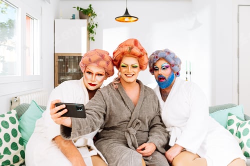Preview: Positive Drag Queens taking selfie on cellphone
