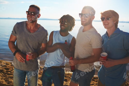 Friends Enjoying Beverages at a Beach Getaway