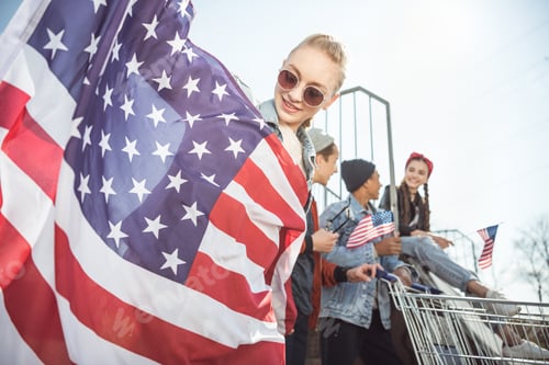 Preview: Teen Friends Celebrating with an American Flag