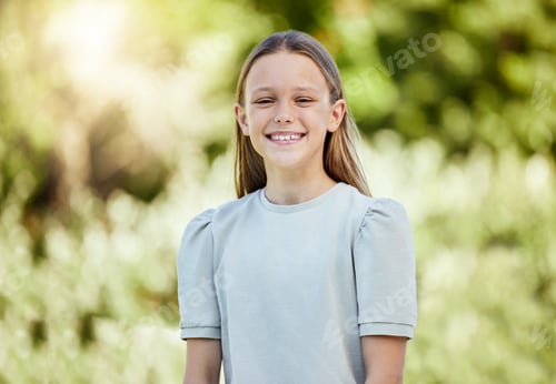 Preview: She has the cutest smile. Shot of an adorable little girl standing outside.