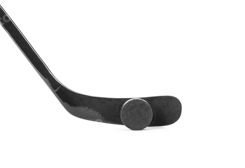 Preview: Black ice hockey stick and puck.