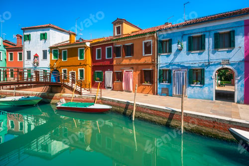 Preview: Burano island canal, colorful houses and boats in the Venice lagoon. Italy