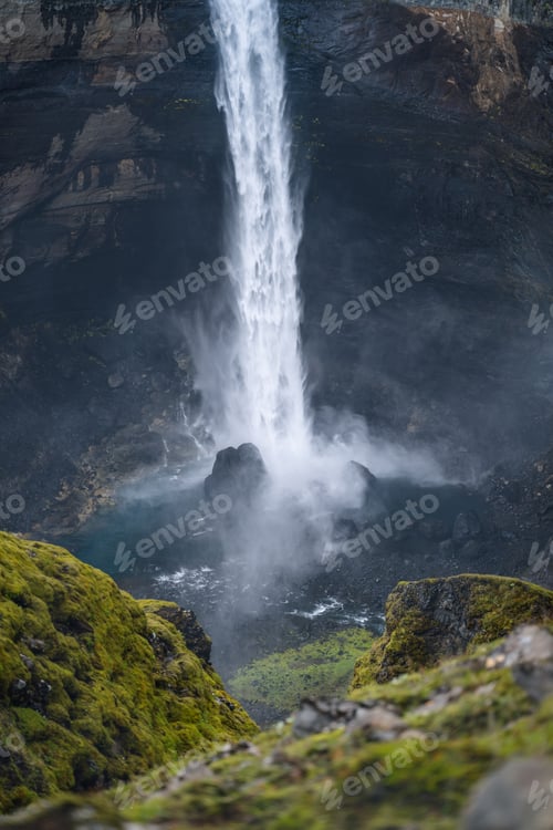 Preview: Close up of Haifoss waterfall in South Iceland. Water is crashing against the rocks on the bottom