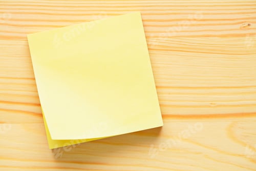 Preview: Yellow memo sticker on wooden wall