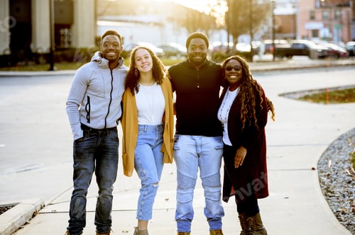 Preview: Cute shot of friends joking and laughing together spreading positivity around