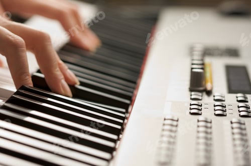 Preview: Woman's Fingers on Digital Piano Keys