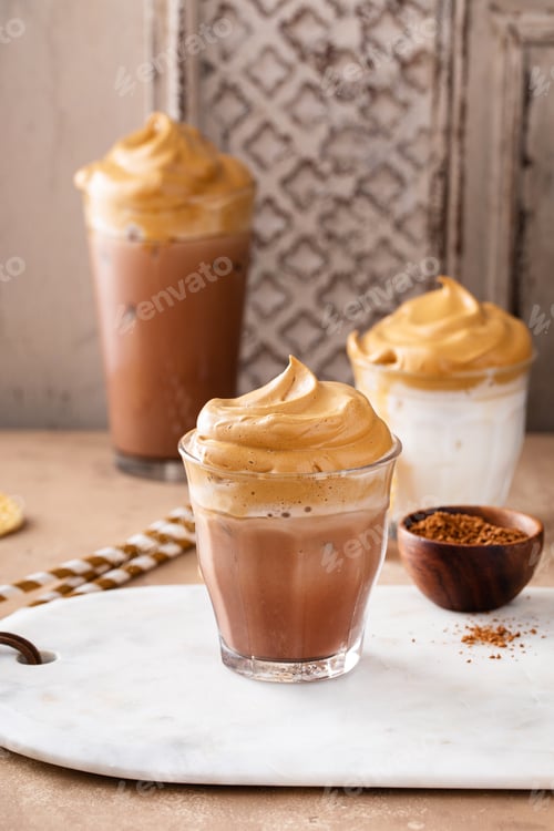 Preview: Chocolate dalgona whipped coffee in a glass with ice