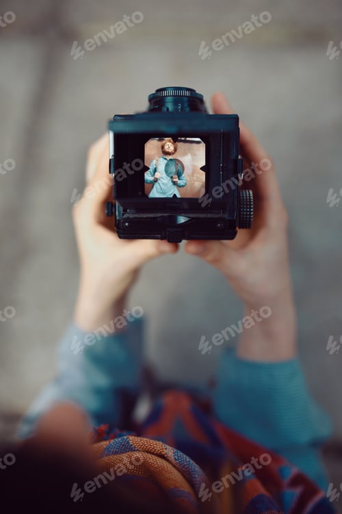 Preview: Shooting a portrait of handsome guy with a vintage camera