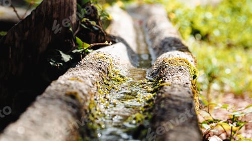 Preview: Water that flows from the spring in the mountains and descends through a gutter