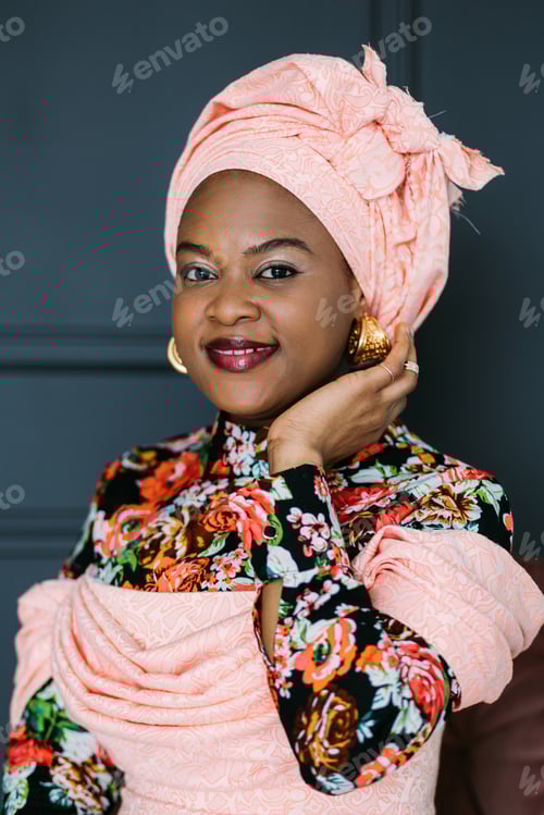 Preview: Romantic cute african woman, wearing stylish traditional dress with african print and headwrap