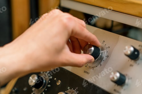 Preview: Sound engineer used digital audio mixer Sliders Engineer presses key Control panel Recording studio