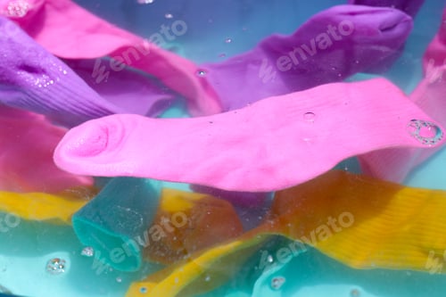 Preview: Cleaning dirty socks in basin of soapy water