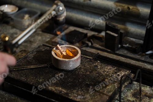 Preview: Manual gold melting using a torch before casting jewelry.