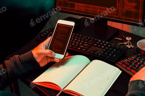 Preview: Close up of programmer of hacker hands typing a code