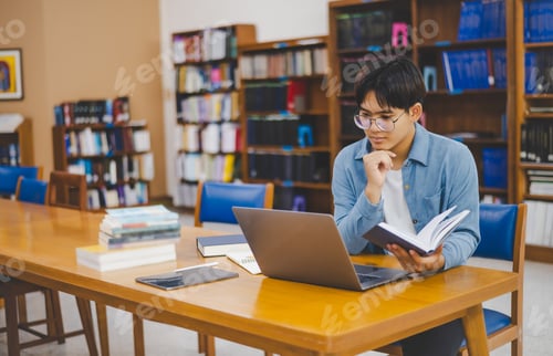Preview: Male college students are working on laptops