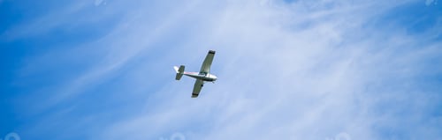 Preview: Airplane in the blue sky. Small aircraft for private flights.