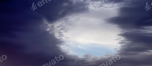 Preview: View of Dramatic Cloudscape during a colorful sunset or sunrise.