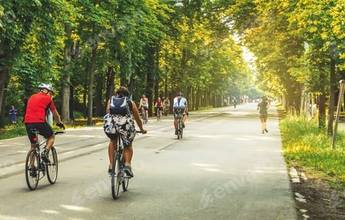 Preview: Prater hauptallee in Vienna Austria, people riding bicycles and jogging