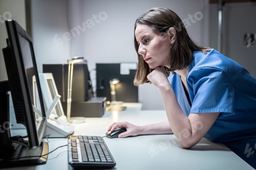 Preview: Health Care Worker In Clinic With Computer And Equipment