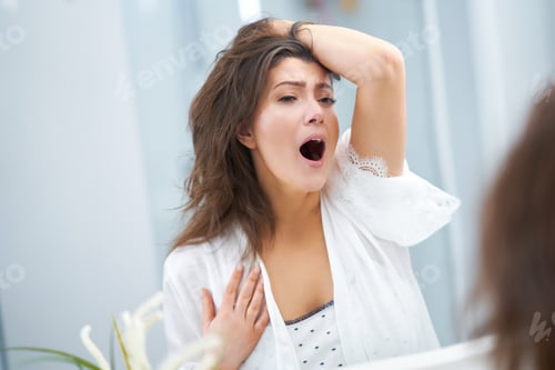 Preview: Young nice brunette woman in the bathroom