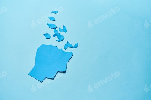 Preview: Alzheimer's disease, senile dementia and memory loss. Fading head silhouette