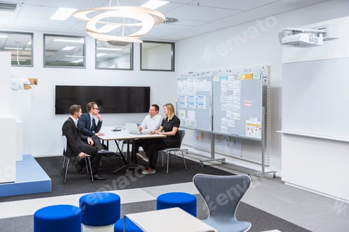 Preview: Business people having a meeting in conference room