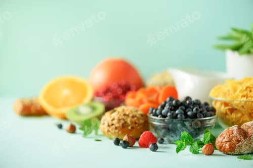 Preview: Vegetarian breakfast. Soft boiled egg, oat flakes, nuts, fruits, berries, milk, yogurt, orange