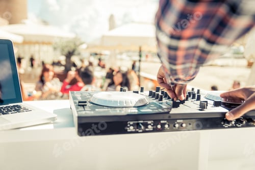 Preview: dj mixer close up while he is mixing