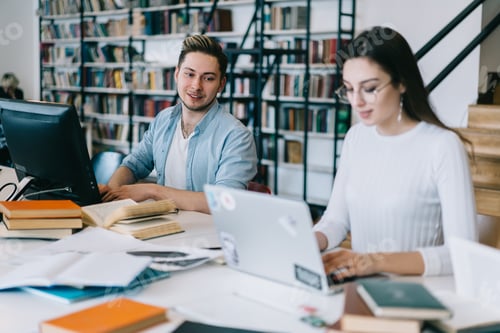 Preview: Smart student enthusiastically looking into the work of girlfriend