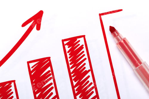 Preview: Red marker highlights upward trend on a business growth chart in an office setting