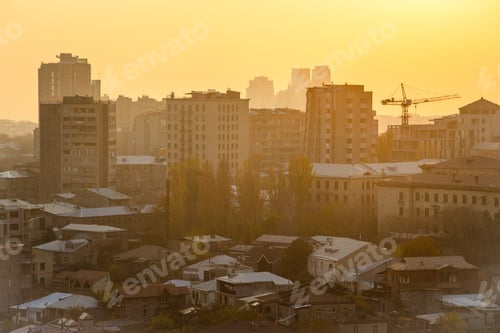 Preview: top view of houses in Yerevan at smoggy sunset