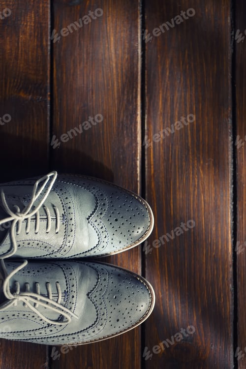 Preview: Grey oxford shoes on wooden background
