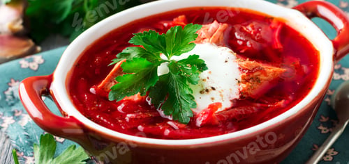 Preview: Beetroot soup with meat, sour cream and parsley in a brown ceramic bowl on the old wooden background