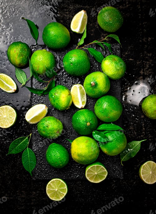 Preview: Pieces and whole lime with leaves.