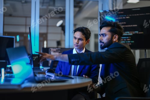 Preview: diverse team of AI developers shares a successful moment in the office.