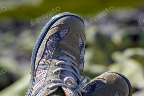 Preview: Close-up top view of pair of old worn comfortable men's classic white sneakers