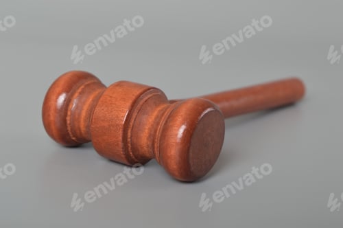 Preview: Judge gavel isolated on a grey background. Arrest and criminal concept.